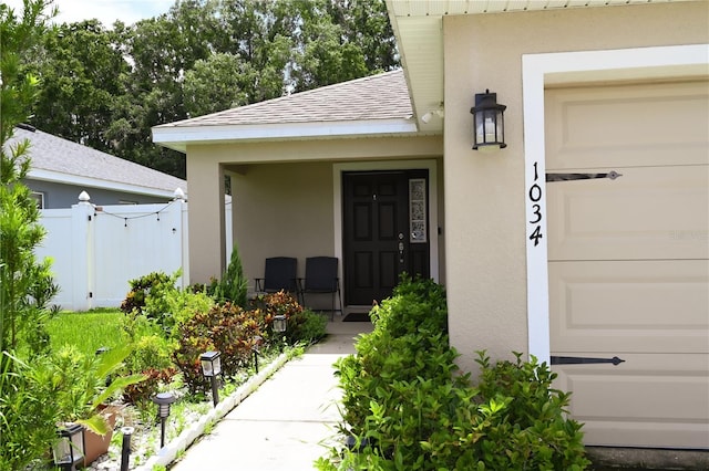 property entrance featuring a garage