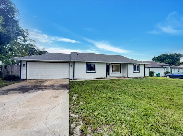 ranch-style house with a front yard and a garage