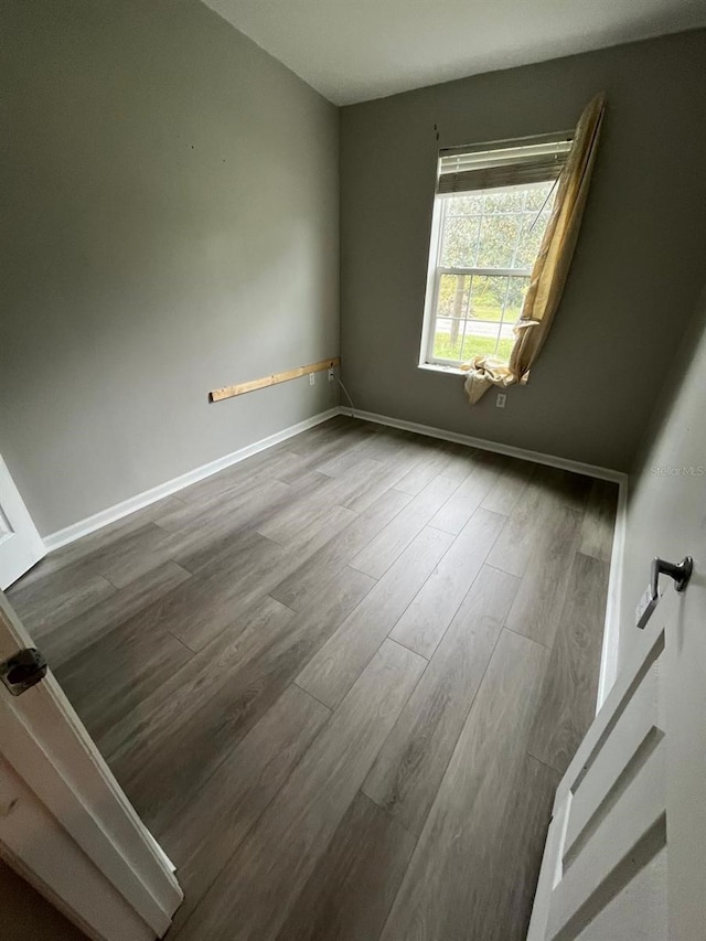 empty room featuring hardwood / wood-style floors