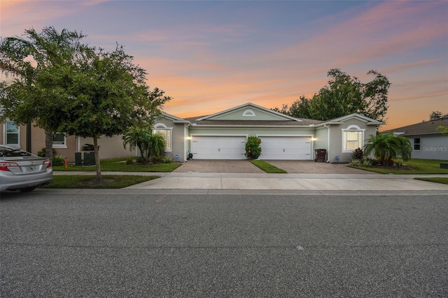 single story home with a garage