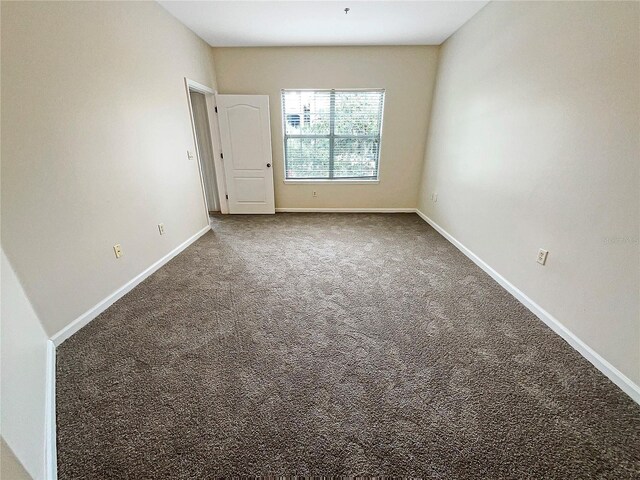 unfurnished room featuring carpet floors