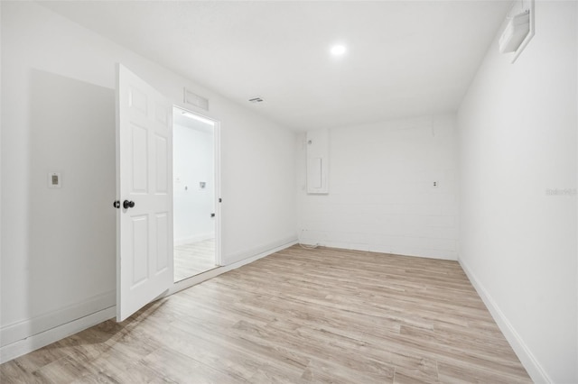 empty room with light wood-type flooring