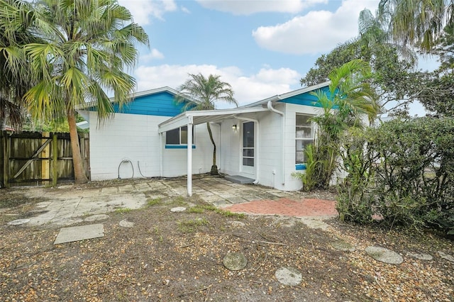 rear view of house with a patio area