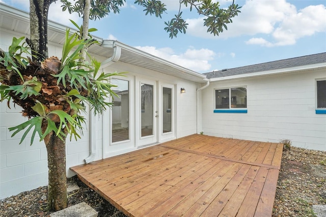 wooden deck featuring french doors