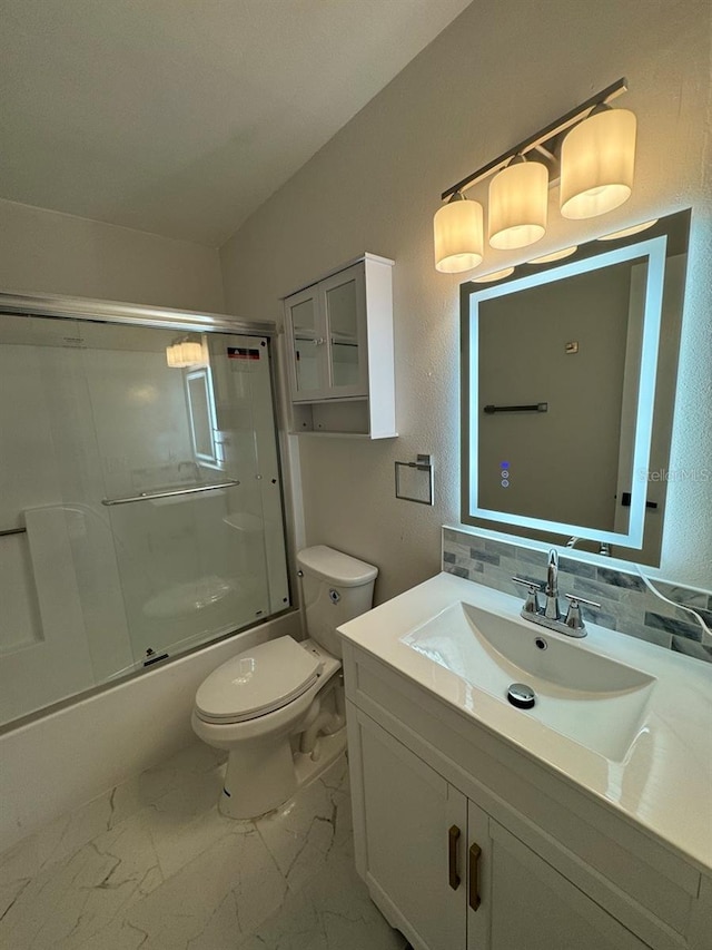 full bathroom featuring vanity, toilet, and enclosed tub / shower combo