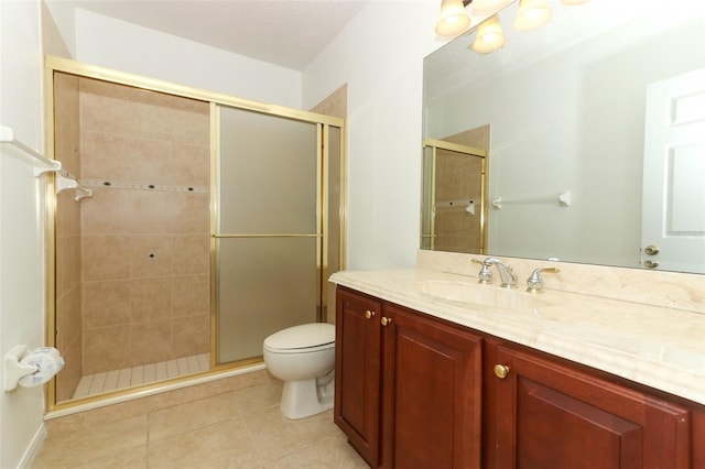 bathroom with walk in shower, tile patterned flooring, vanity, and toilet