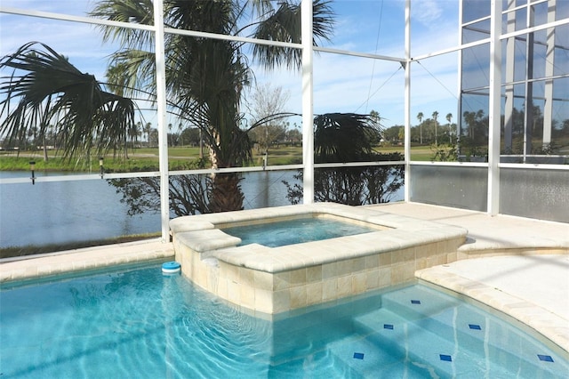 view of pool with a lanai, an in ground hot tub, and a water view