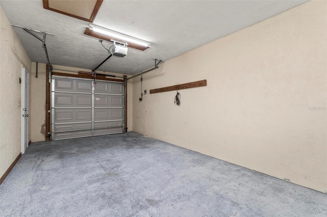 garage featuring a garage door opener