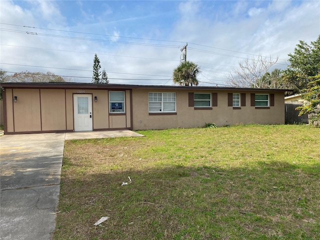 view of front of home with a front lawn