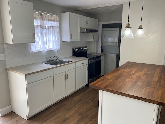 kitchen featuring electric stove, white cabinetry, stacked washer / drying machine, wood counters, and exhaust hood