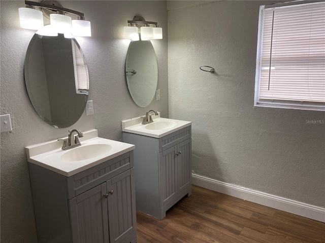 bathroom featuring vanity and hardwood / wood-style floors