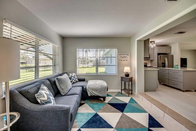 living room featuring light tile patterned floors