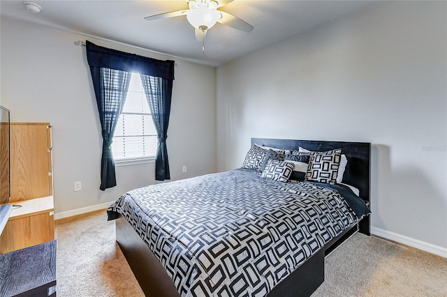 bedroom featuring ceiling fan and carpet floors