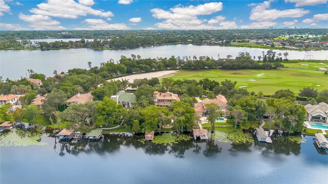 aerial view with a water view and golf course view