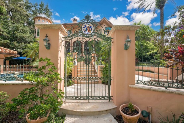 view of gate featuring a fenced front yard