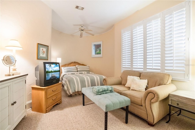 bedroom with ceiling fan and visible vents