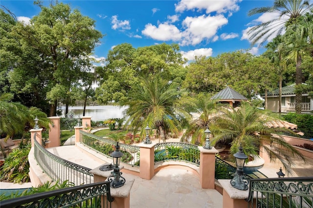 view of home's community with a gazebo and a patio area