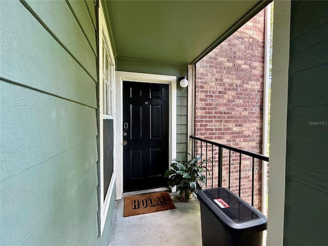 doorway to property with a balcony