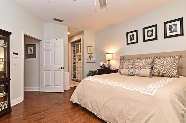 bedroom featuring dark hardwood / wood-style floors