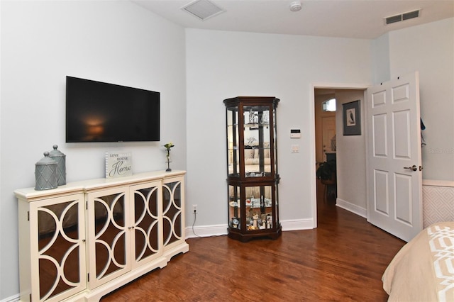 bedroom featuring dark hardwood / wood-style floors