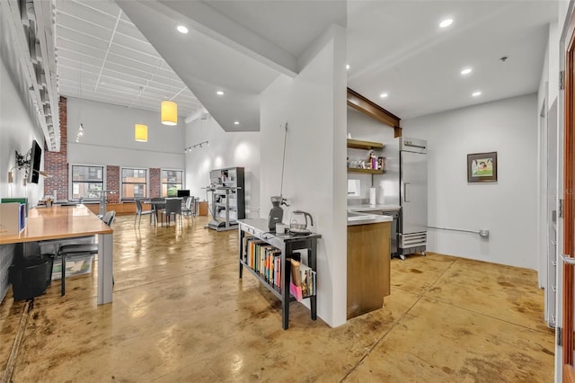 kitchen with stainless steel built in refrigerator