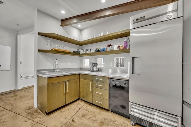 kitchen featuring stainless steel counters, sink, dishwasher, and stainless steel built in refrigerator