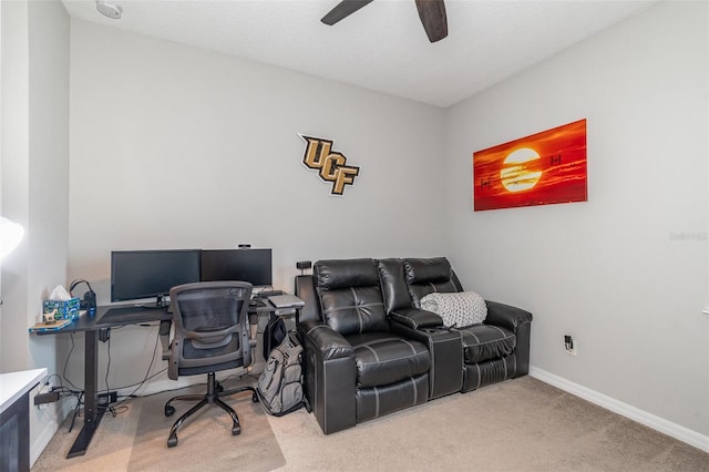 office space with ceiling fan, light carpet, and a textured ceiling