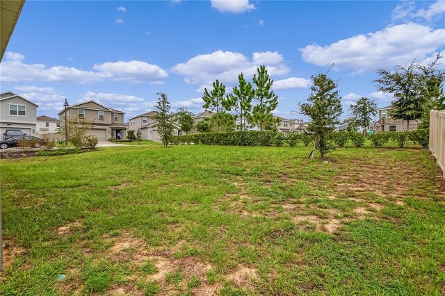 view of yard with a garage