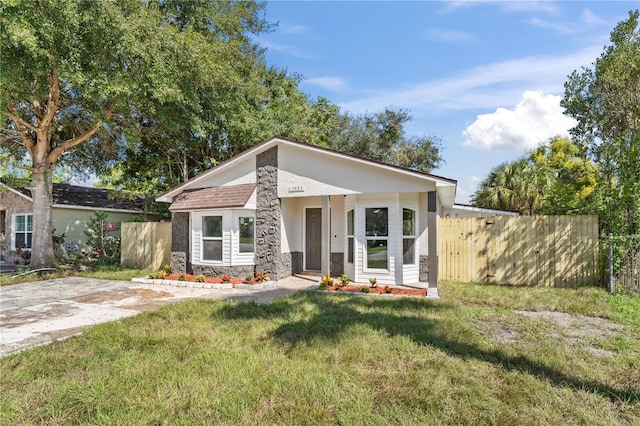 view of front of property with a front lawn