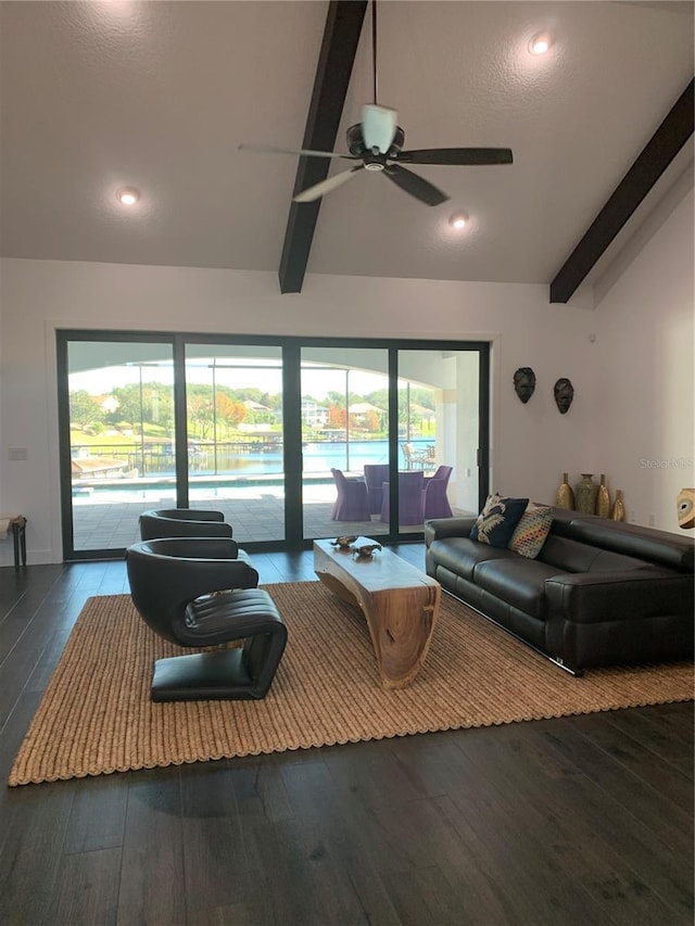 living room with hardwood / wood-style floors, vaulted ceiling with beams, and ceiling fan