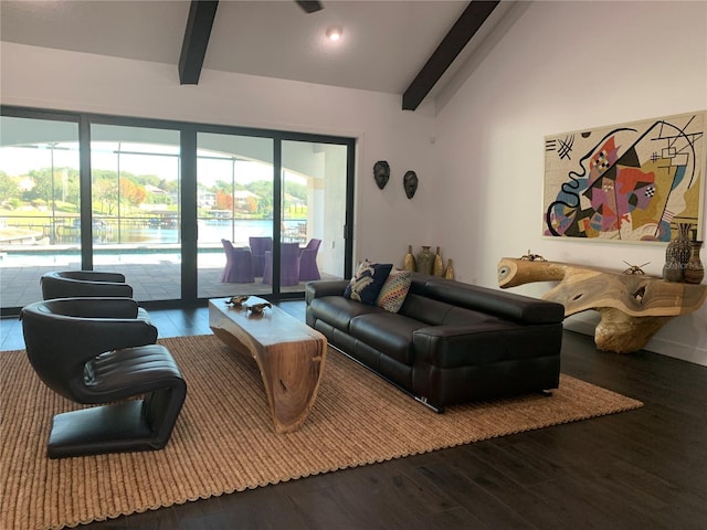 living room with wood-type flooring and vaulted ceiling with beams