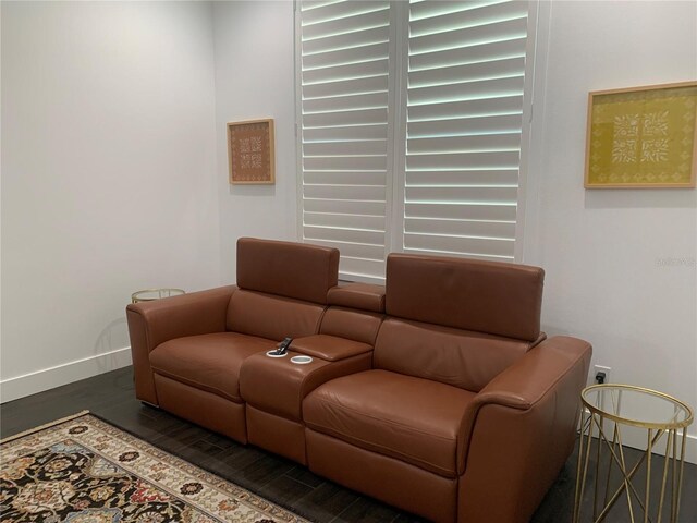 sitting room with dark hardwood / wood-style floors