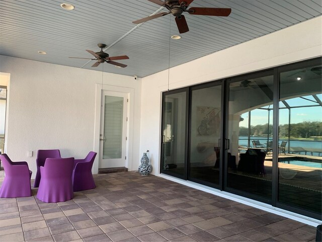 view of patio / terrace featuring ceiling fan