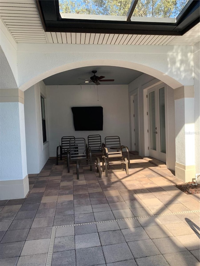 view of patio featuring outdoor lounge area and ceiling fan