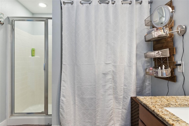 bathroom with vanity and a shower with curtain