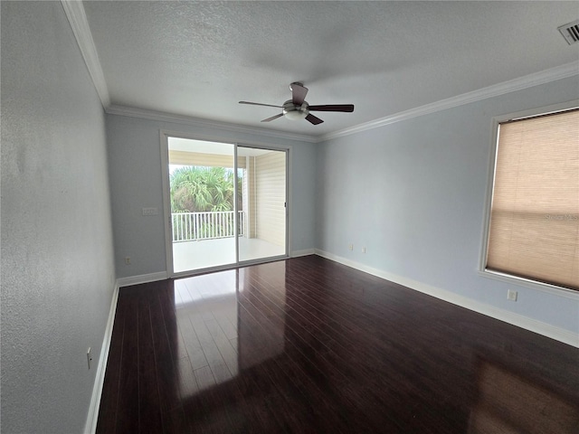 spare room featuring ornamental molding, wood-type flooring, and ceiling fan