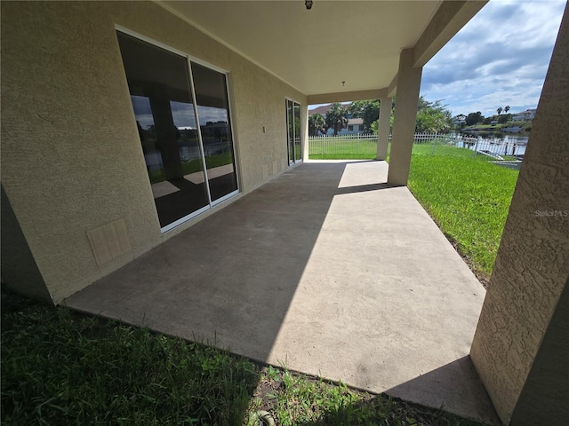 view of patio / terrace featuring a water view