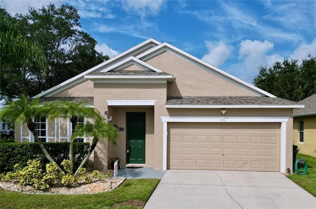 view of front of property featuring a garage