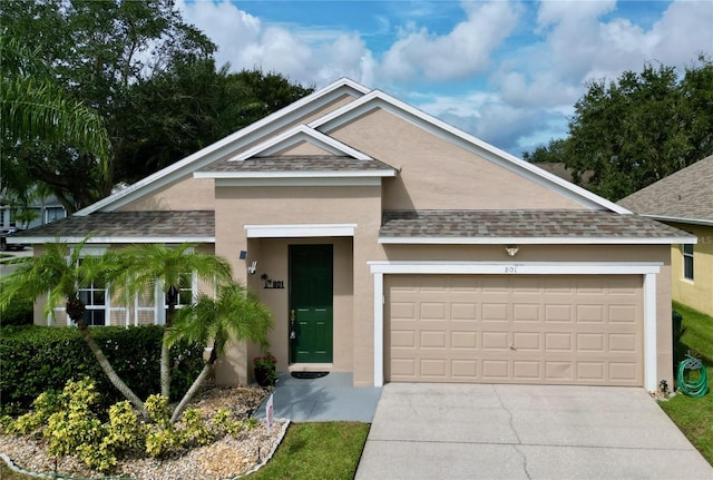 view of front of home with a garage