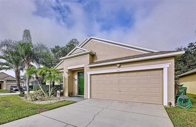 view of front of property with a garage