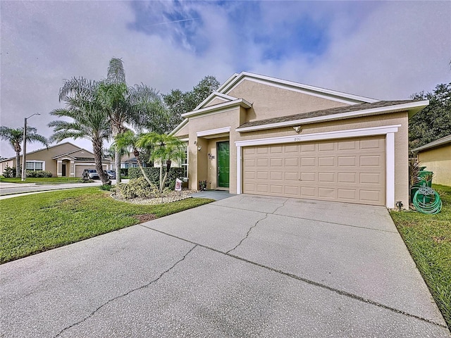 view of front of property featuring a garage and a front yard