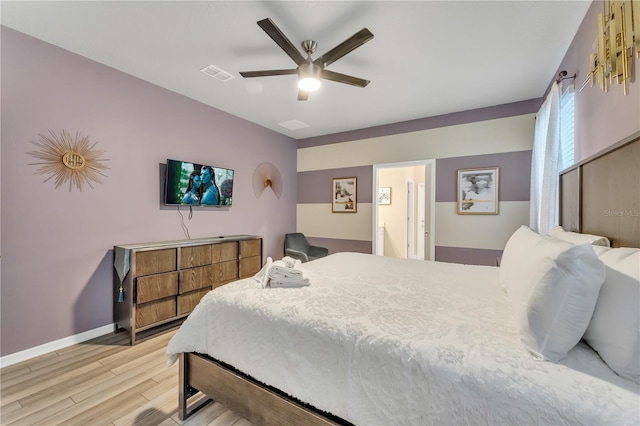 bedroom with ceiling fan and light wood-type flooring