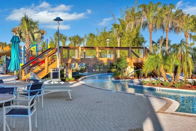 view of pool featuring a patio area and pool water feature