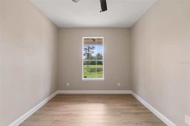 empty room featuring light hardwood / wood-style floors and ceiling fan