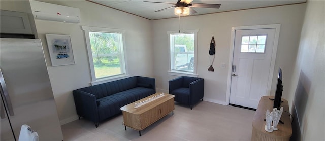 entryway with crown molding, an AC wall unit, baseboards, and a healthy amount of sunlight