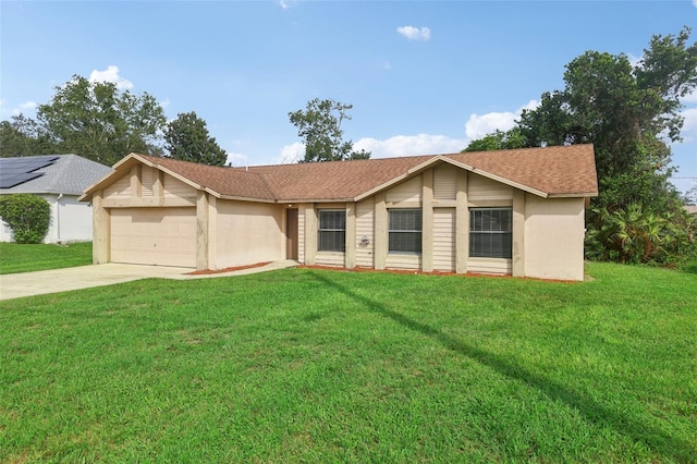 single story home featuring a front yard and a garage