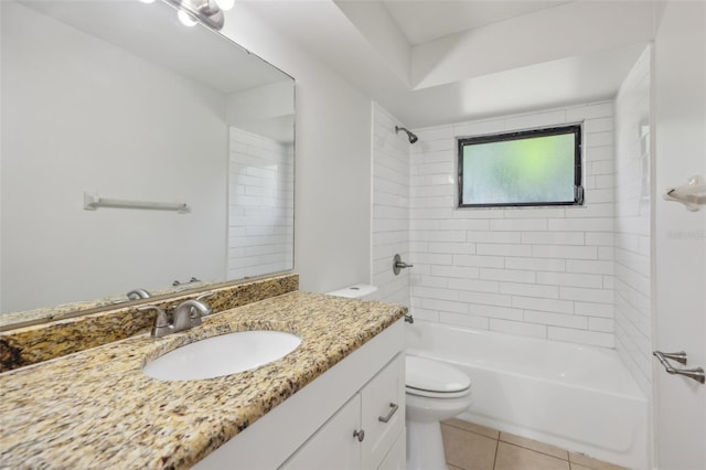 full bathroom with tile patterned flooring, tiled shower / bath combo, vanity, and toilet