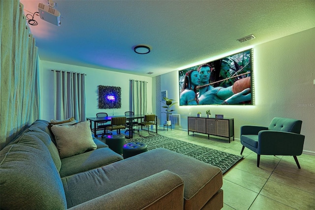 living room featuring a textured ceiling and tile patterned flooring