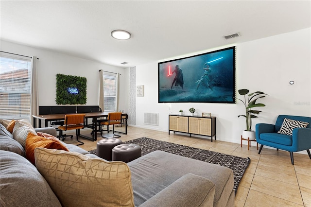 tiled living room with plenty of natural light