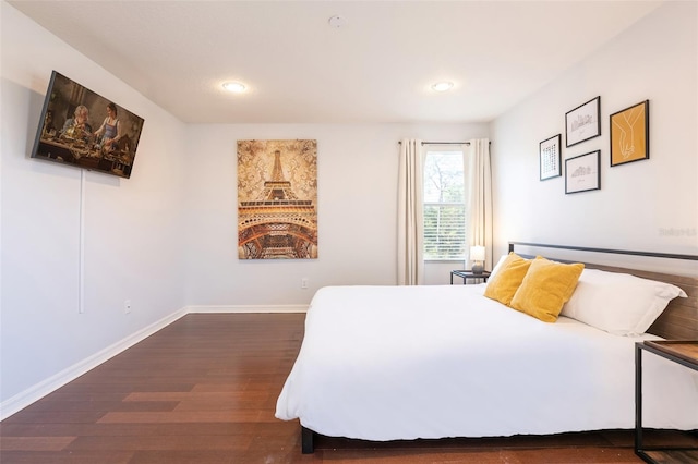 bedroom featuring dark wood-type flooring